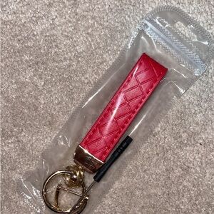 Elegant Red Keychain with Gold Accents